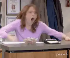 Pam Beesly screaming and throwing something