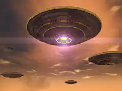 UFOs flying in orange sky
