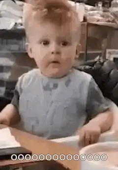 Baby looks around in shock