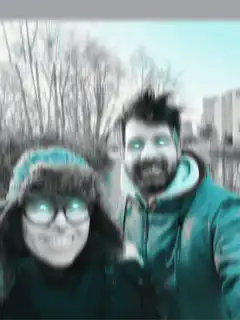 Couple selfie with glowing eyes and filters