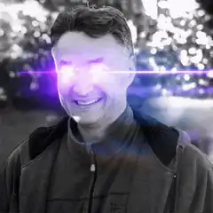 Man with glowing purple eyes