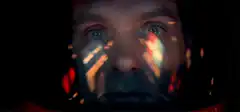 Astronaut face with fire reflections
