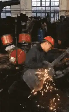 Man plays guitar with angle grinder