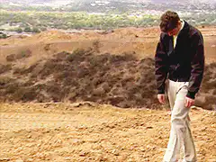 Man walking on a dirt path