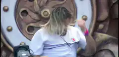 DJ headbanging and raising arms