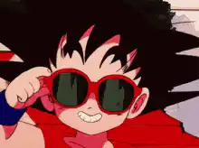 Goku wearing sunglasses peace sign
