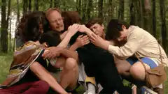 group hug in the woods