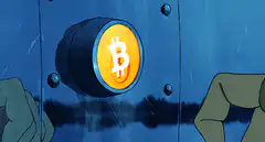 Hand inserts key into Bitcoin lock