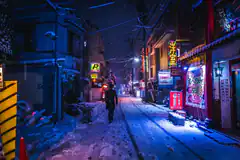 Snowy Japanese street at night