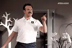 Ted Lasso points and says yes