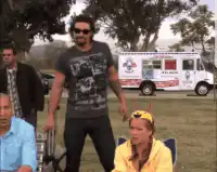 Jesse Pinkman sits down in a chair