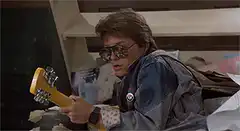 Marty McFly takes off his sunglasses