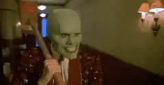 The Mask hits himself with a mallet