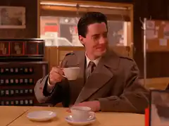 Dale Cooper sips coffee