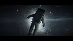 Astronaut with a box head floating in space