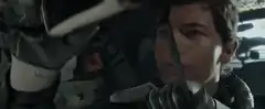 Guy in mech suit activates cockpit display