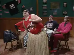 Fat Tony hula dancing in the bar