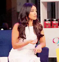 Gina Rodriguez talking and gesturing