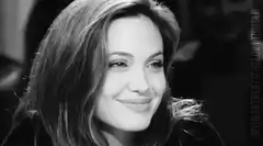 Angelina Jolie smiling and laughing