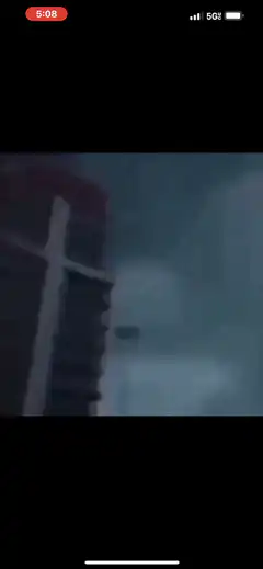 Lightning flash over city buildings