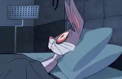 Bugs Bunny wide awake in bed