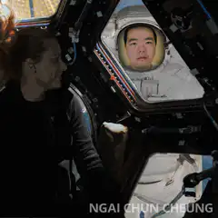 Astronaut floating past window