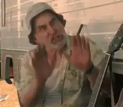 Old man yelling at guitar
