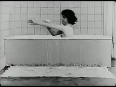 woman in bathtub with smoke effect