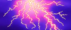 Neon lightning bolts on purple background