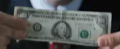 Leonardo DiCaprio throws hundred dollar bill in trash