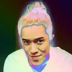Blonde man in bun with shifting colors
