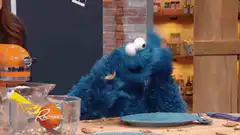 Cookie Monster eats cookies on Rachael Ray show