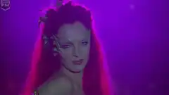 Woman with butterfly makeup turns around