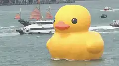 Giant yellow rubber duck in harbor