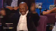Mike Tyson laughing hysterically