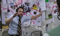 Charlie Day pointing at conspiracy board