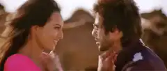 Man and woman smiling at each other