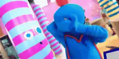 Blue character playing drums with text overlay