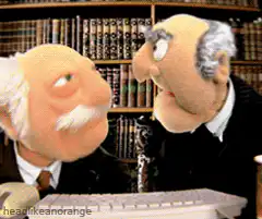 Two old men puppets singing