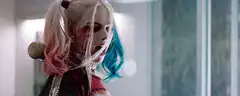 Harley Quinn turns and smiles