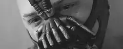 Bane adjusting his mask