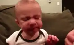 Baby crying with red face