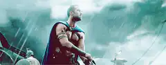 Gerard Butler as Leonidas aiming a bow
