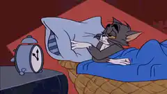 Tom sleeping in bed