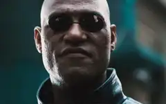 Morpheus smirks in The Matrix