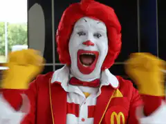 Ronald McDonald cheering excitedly