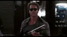 Arnold Schwarzenegger with shotgun