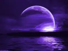 purple planet over water