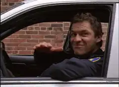 Andy Dwyer in car waving