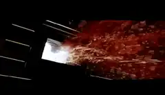 Body being crushed in a hydraulic press
